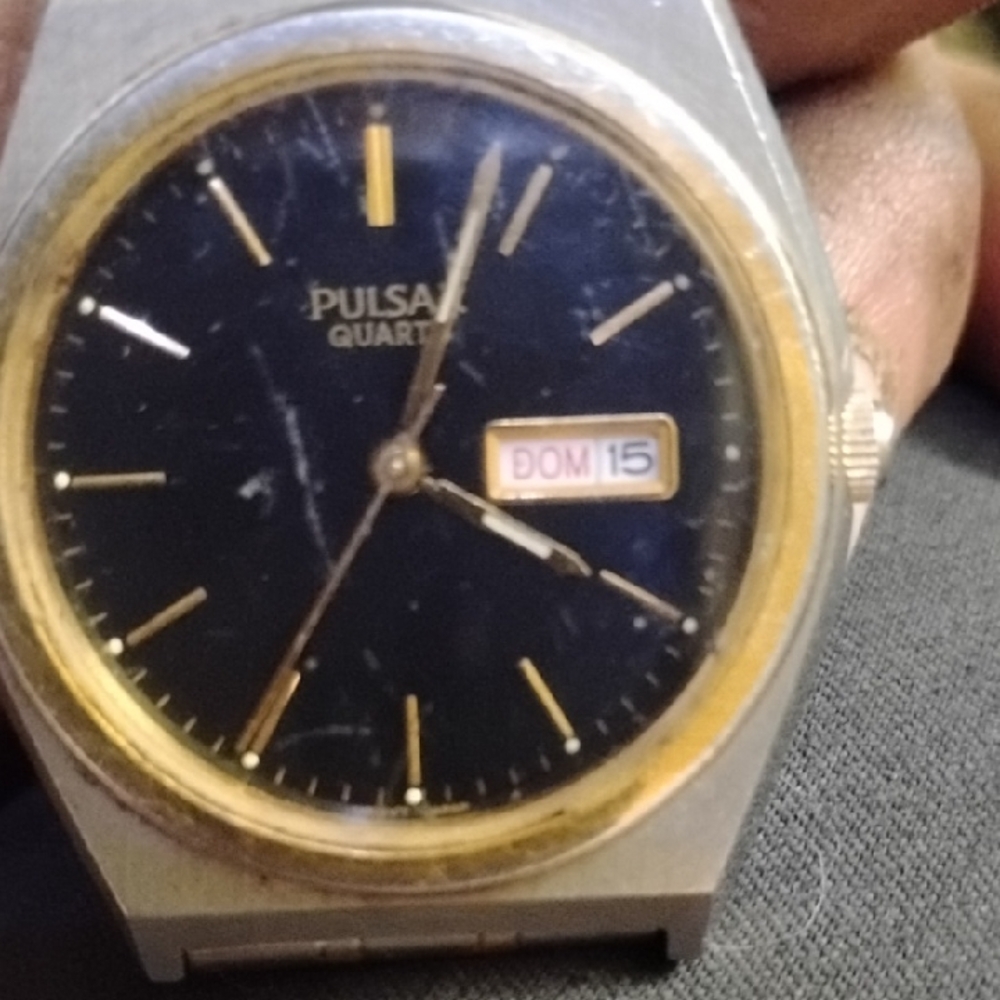 Pulsar Quartz Watch with Black and Gold Face